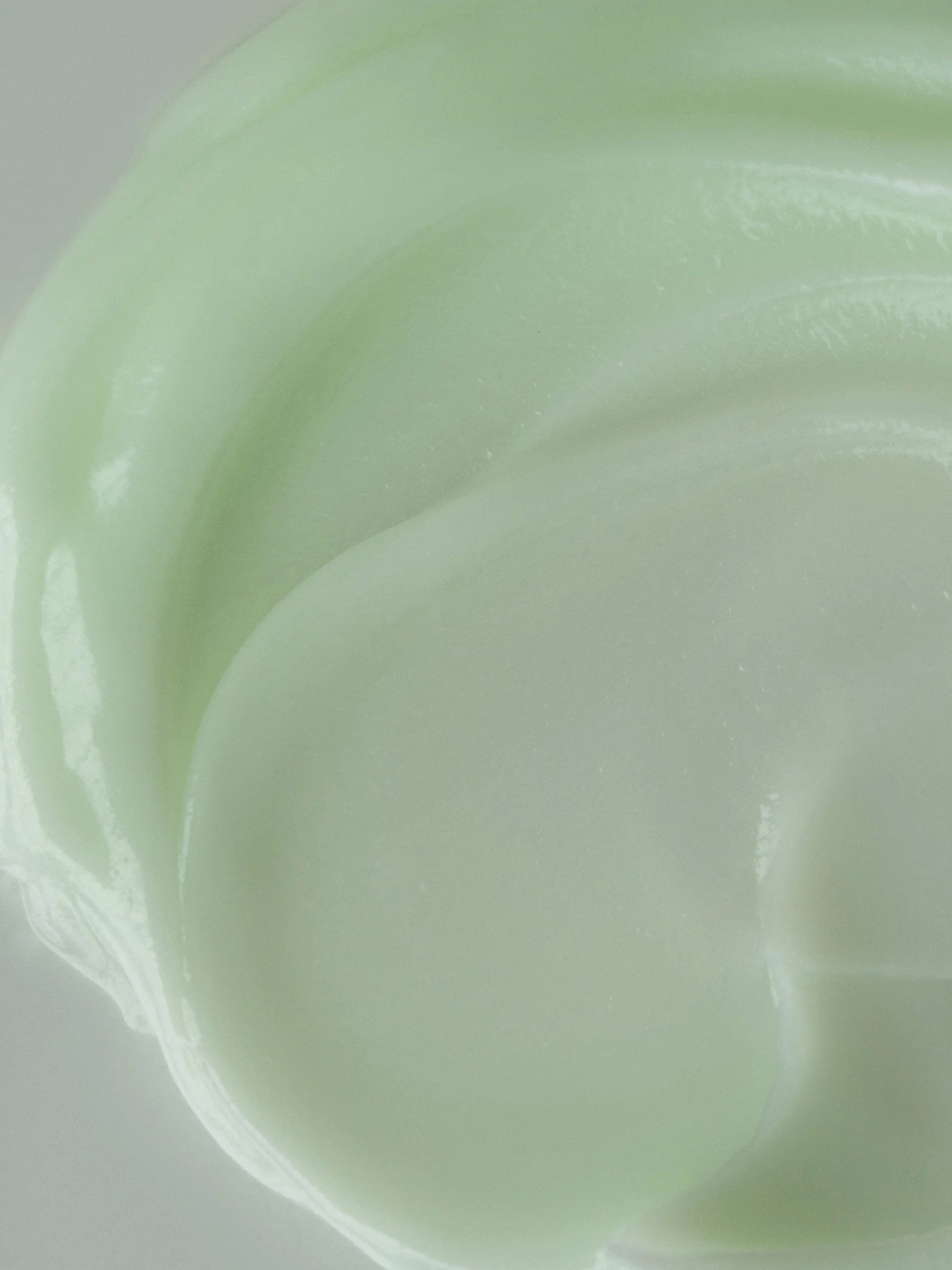 Close-up of the texture of Abib Heartleaf Crème Calming Tube, showing its soft sherbet consistency that melts on contact.