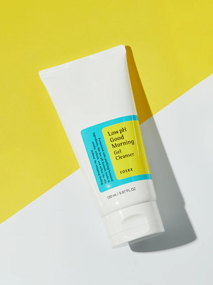 A tube of Cosrx Low pH Good Morning Gel Cleanser on a bright yellow background, highlighting its minimalist design and blue label.