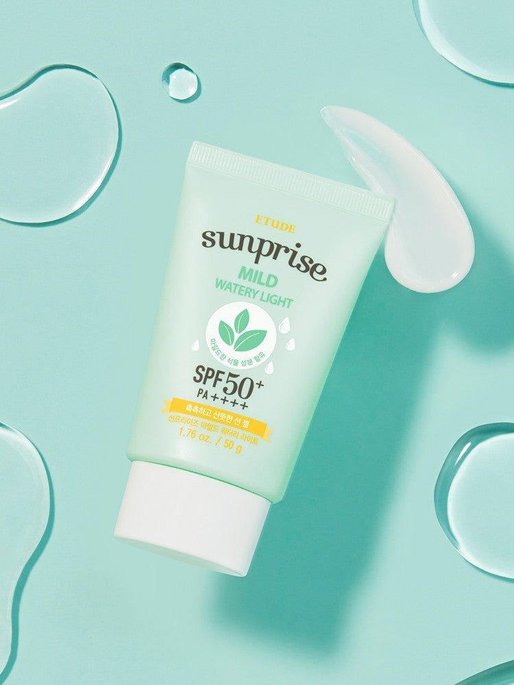 A tube of Etude Sunprise Mild Watery Light Sunscreen SPF 50+, surrounded by water droplets on a mint green background.
