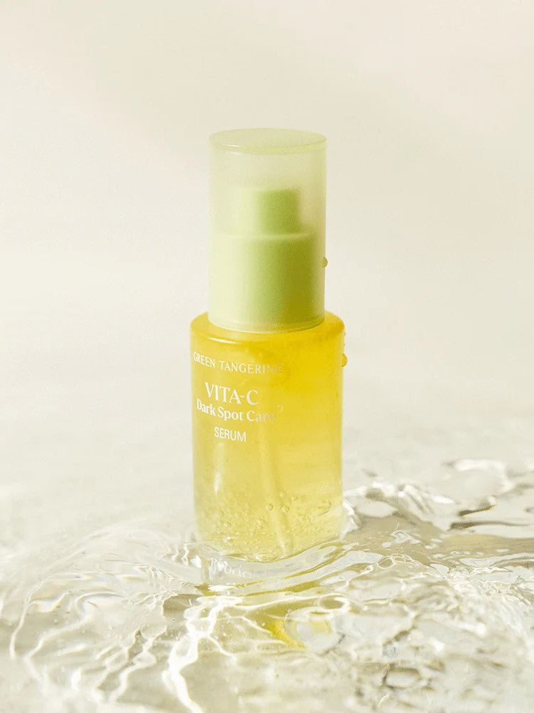 Goodal Green Tangerine Vita-C Dark Spot Care Serum bottle, highlighting its bright yellow gel-like texture and minimalistic design.