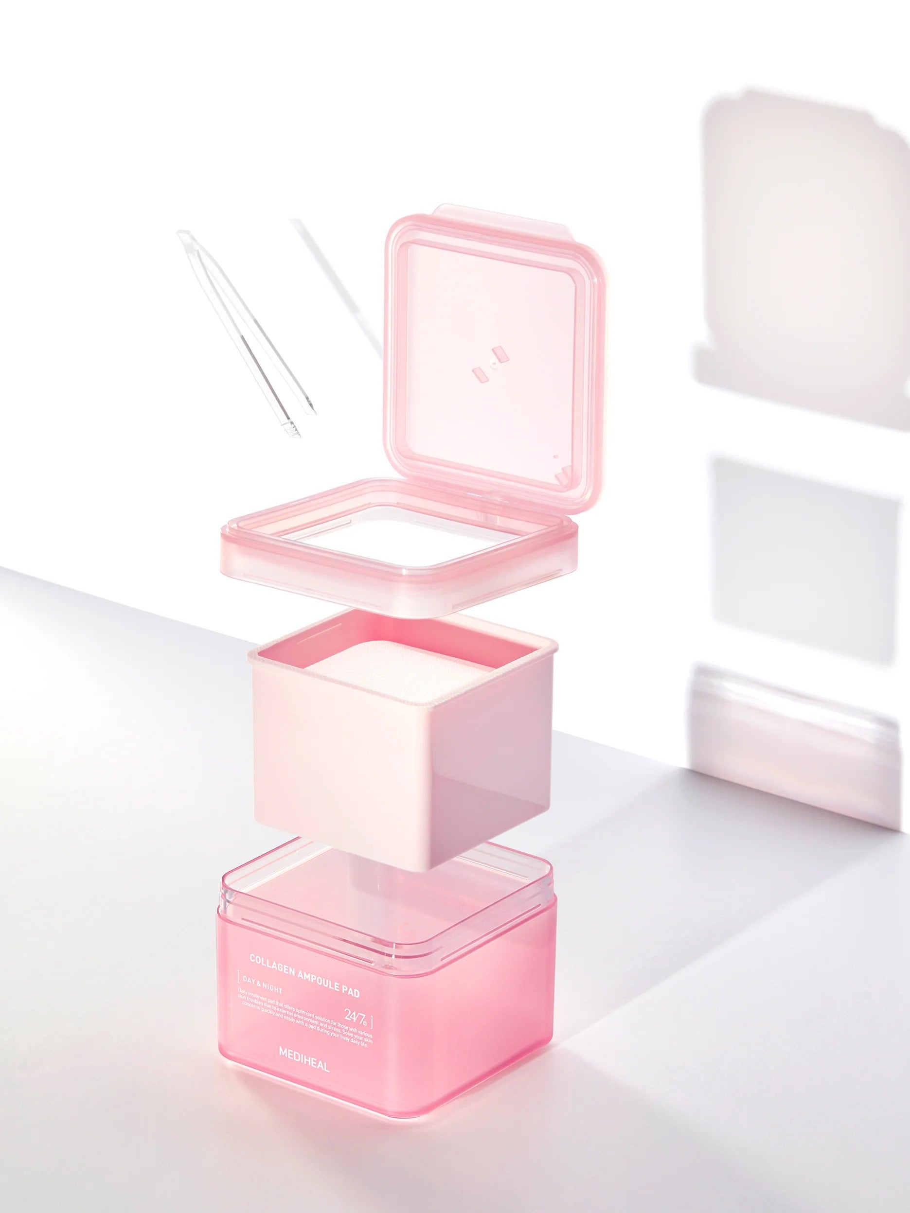 Pink container of Mediheal Collagen Ampoule Pads with an upper compartment and pads inside, paired with a clear applicator tool, set against a bright background to showcase the refill method.