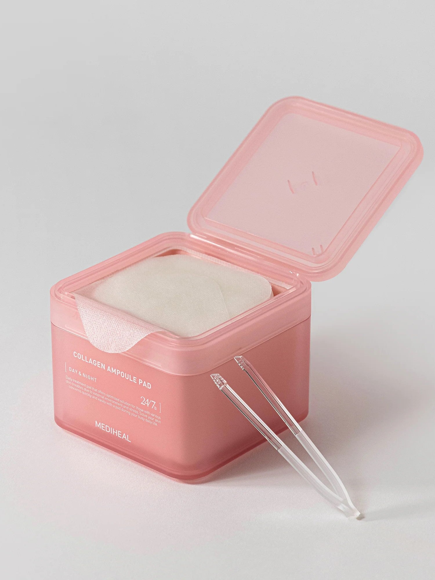 Pink container of Mediheal Collagen Ampoule Pads with a clear applicator beside it, highlighting its hygienic design and skincare benefits.