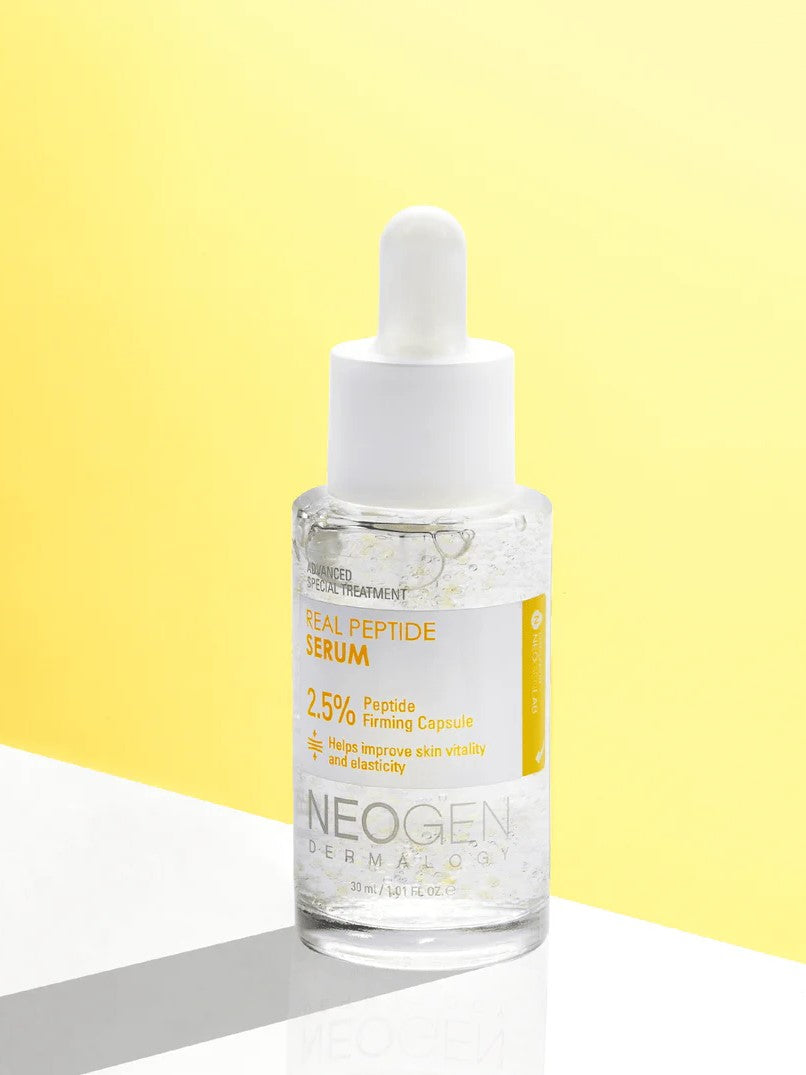 Neogen Real Peptide Serum in a transparent dropper bottle, featuring a 2.5% peptide formula, set against a bright yellow background.