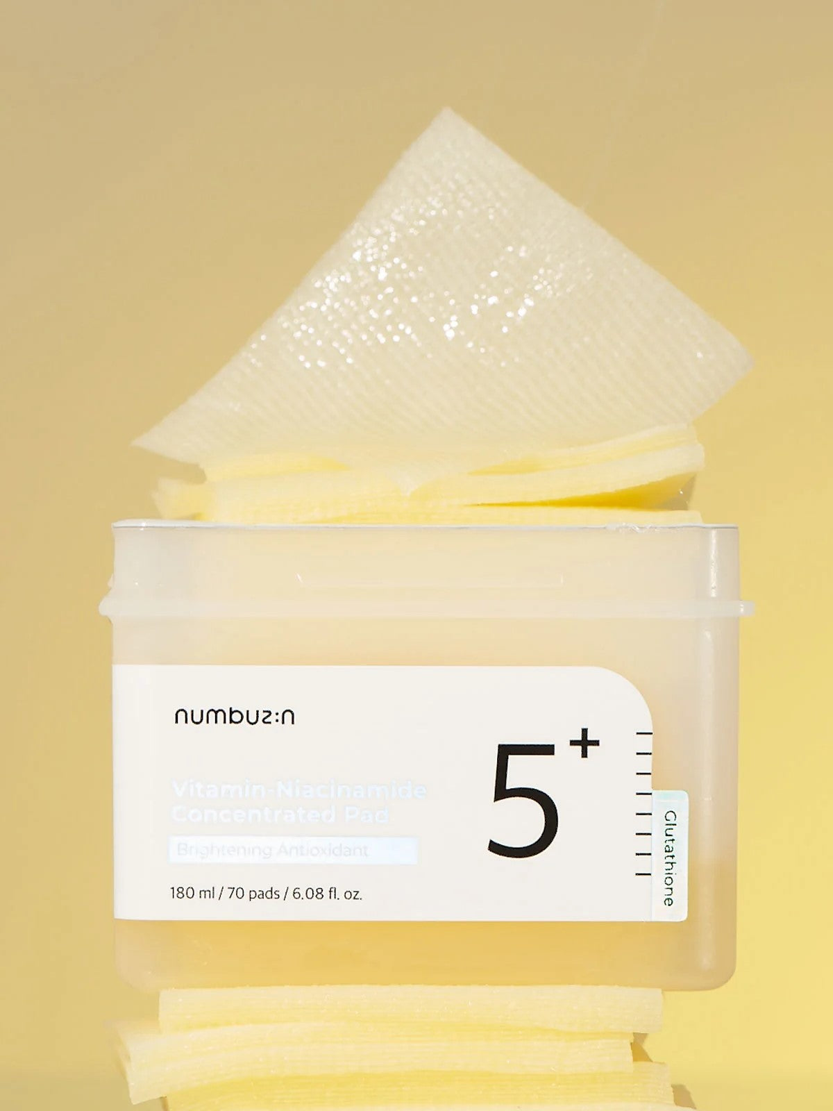 The texture of Numbuzin No.5 Vitamin-Niacinamide Concentrated Pad, highlighting its pure cotton gauze material.