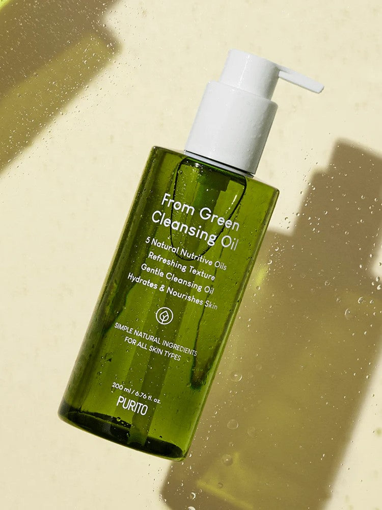 Purito From Green Cleansing Oil bottle with pump, labeled with benefits including hydration, nourishment, and suitability for all skin types.
