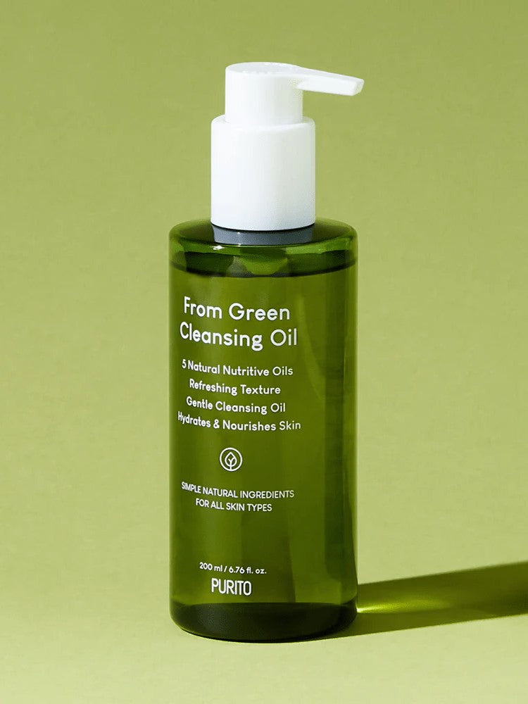 Green bottle of Purito From Green Cleansing Oil with a pump top, showcasing labels highlighting benefits and natural ingredients suitable for all skin types.