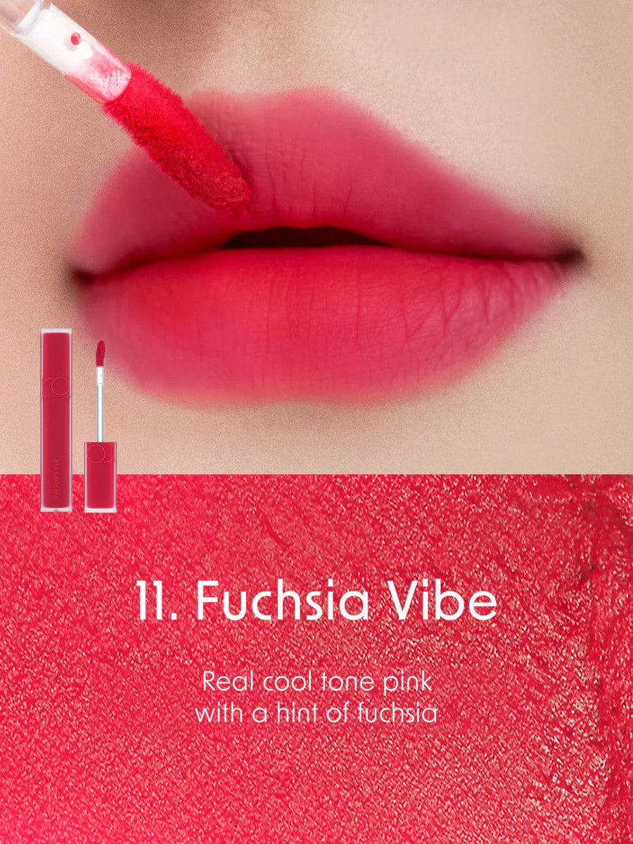Close-up of lips wearing Romand Blur Fudge Tint in the shade Fuchsia Vibe.