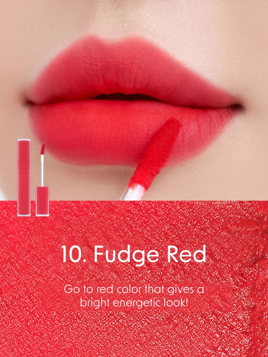 Close-up of lips wearing Romand Blur Fudge Tint in the shade Fudge Red.