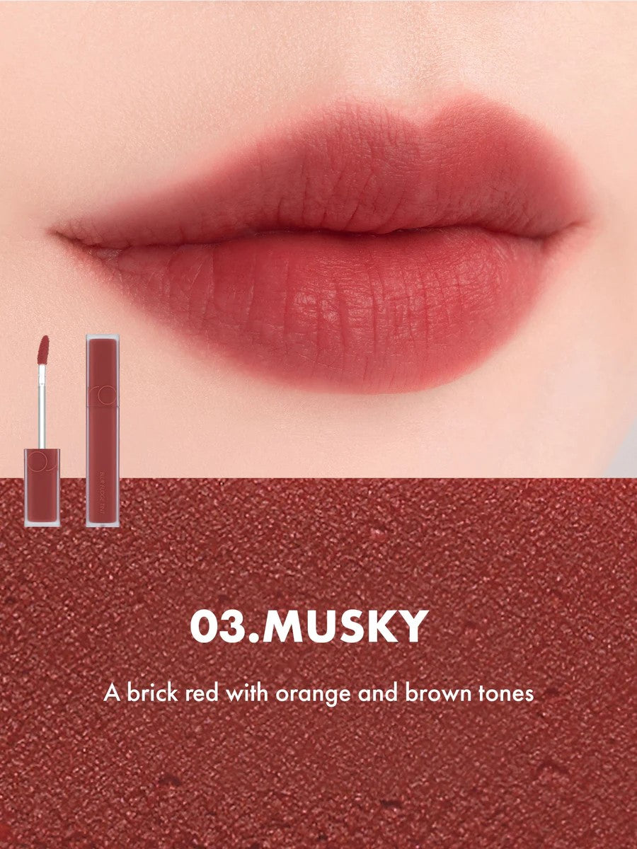 Close-up of lips wearing Romand Blur Fudge Tint in the shade Musky.