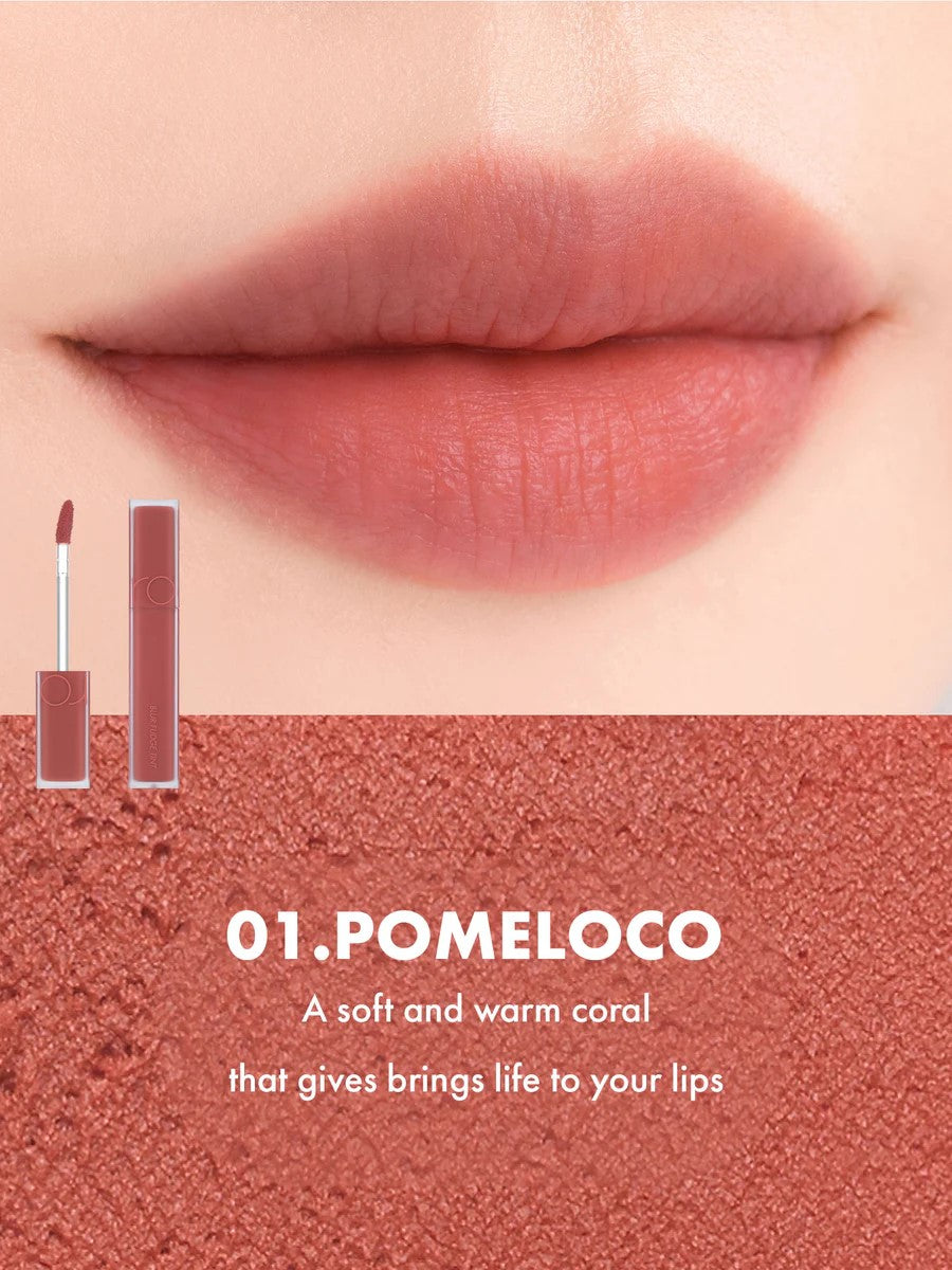Close-up of lips wearing Romand Blur Fudge Tint in the shade Pomeloco.