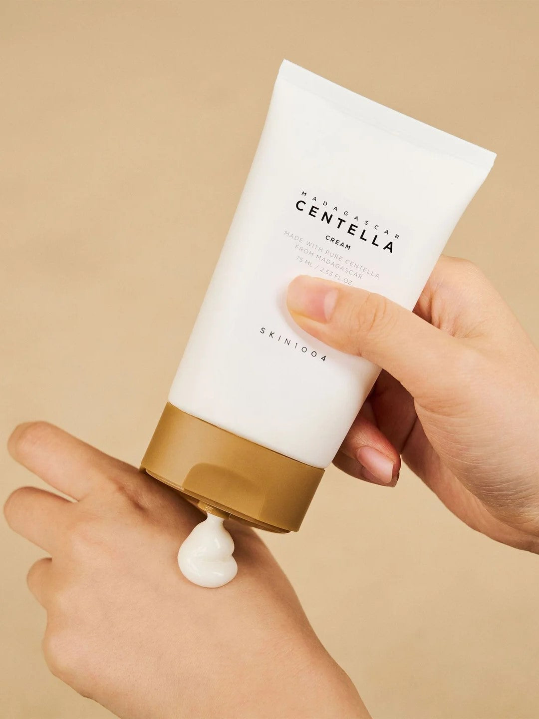 skin 1004 madagascar centella cream texture with hands