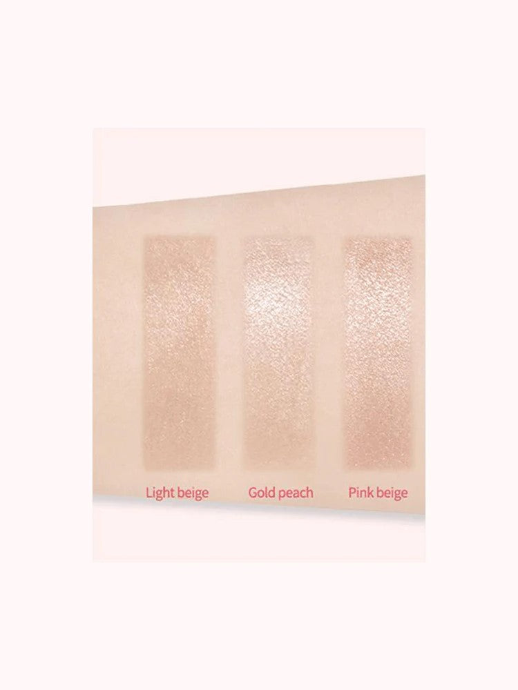 Three swatches of Too Cool for School Artclass By Rodin Highlighter #1 Glam in Light Beige, Gold Peach, and Pink Beige, showcasing their shimmering textures.