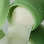 Abib Heartleaf Spot Pad Calming Touch with pads coming out, showcasing its convenient format.