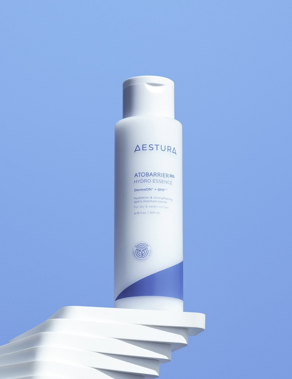 Aestura Atobarrier 365 Hydro Essence bottle promoting hydration for dry and weakened skin, displayed against a clear blue background.