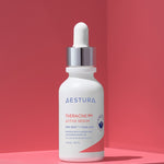 Aestura Theracne 365 Active Serum bottle on a soft pink background, formulated for oily and acne-prone skin with refining ingredients.
