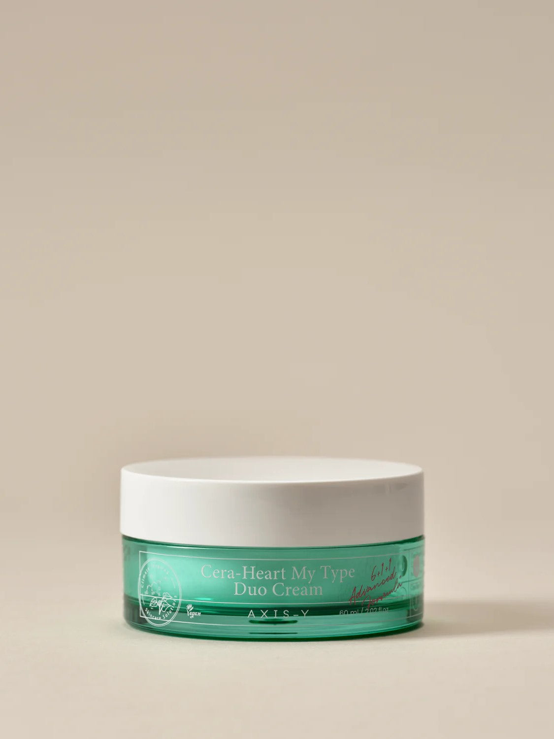 Teal container of Axis-Y Cera-Heart My Type Duo Cream with white lid, labeled with product details, on a neutral background.