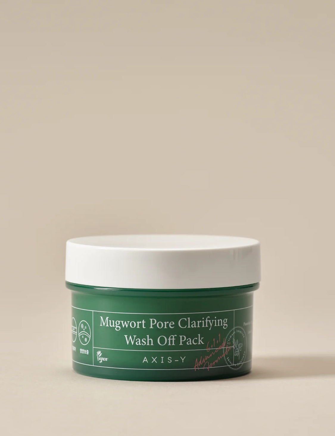 Green jar of Mugwort Pore Clarifying Wash Off Pack by AXIS-Y with minimalist design and vegan labeling, set against a neutral backdrop.