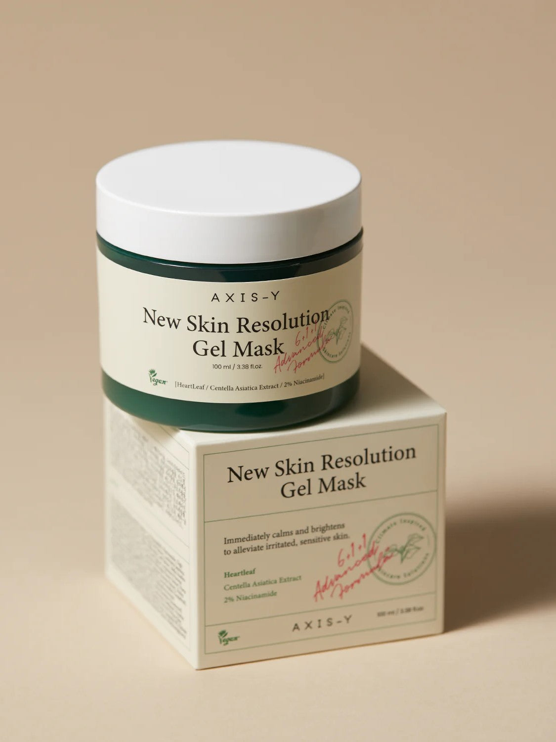 Green container of AXIS-Y New Skin Resolution Gel Mask with its box, highlighting soothing ingredients for sensitive skin.