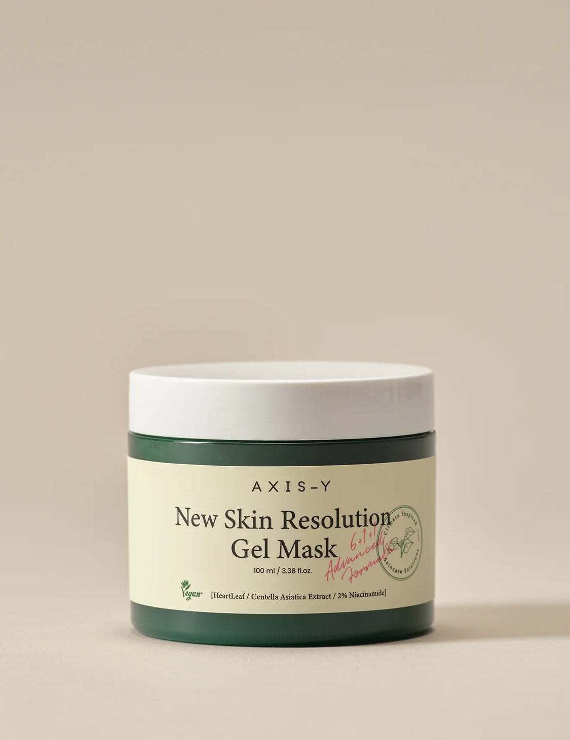 Green jar of AXIS-Y New Skin Resolution Gel Mask with a cream label, highlighting key ingredients like Heartleaf, Centella Asiatica, and Niacinamide, on a neutral background.