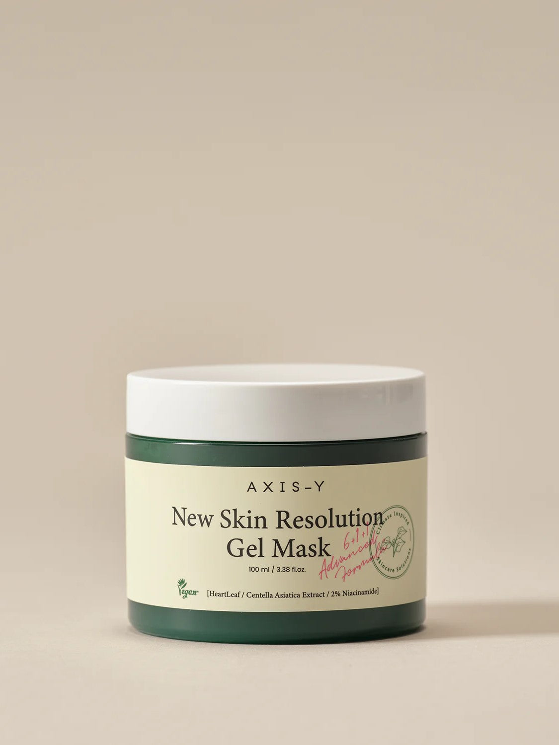 Green jar of AXIS-Y New Skin Resolution Gel Mask with a cream label, highlighting key ingredients like Heartleaf, Centella Asiatica, and Niacinamide, on a neutral background.
