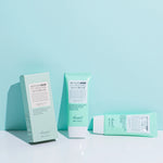 Three Benton Air Fit UV Defense Sun Cream tubes displayed on a blue background, showcasing the packaging design.