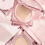 Two translucent CLIO Kill Cover Mesh Glow Cushion compacts displayed on a soft pink background.