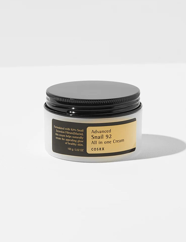 Cosrx Advanced Snail 92 All in One Cream in a sleek white jar, showcasing its 92% snail secretion filtrate for nourishing and repairing skin.