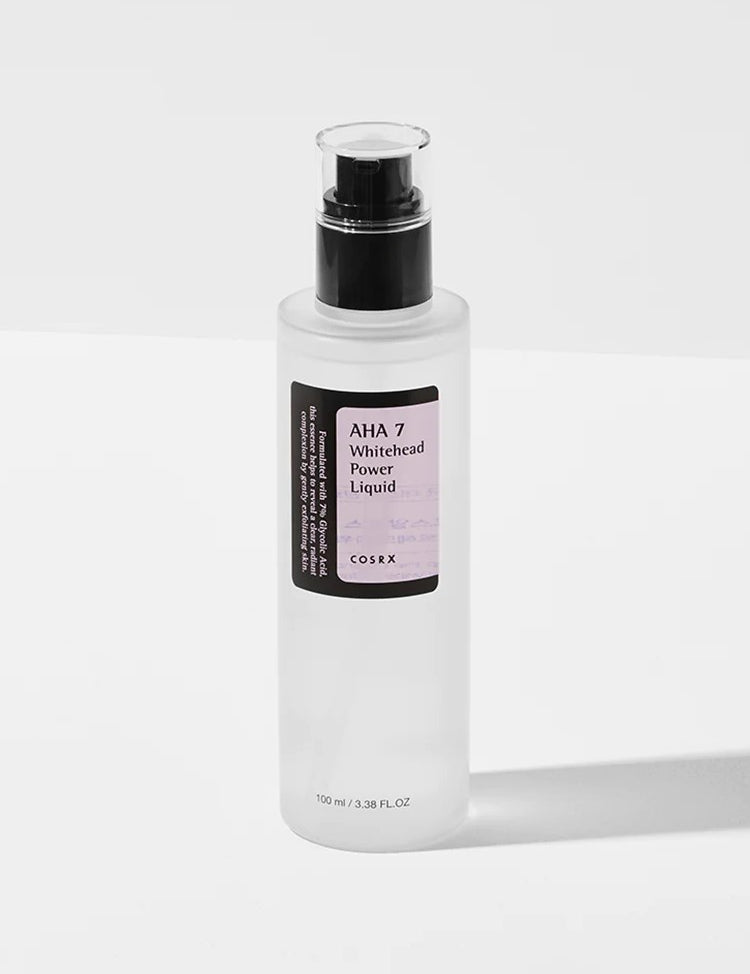 A transparent bottle of Cosrx AHA 7 Whitehead Power Liquid with a black pump, designed for exfoliation, brightening, and whitehead removal.
