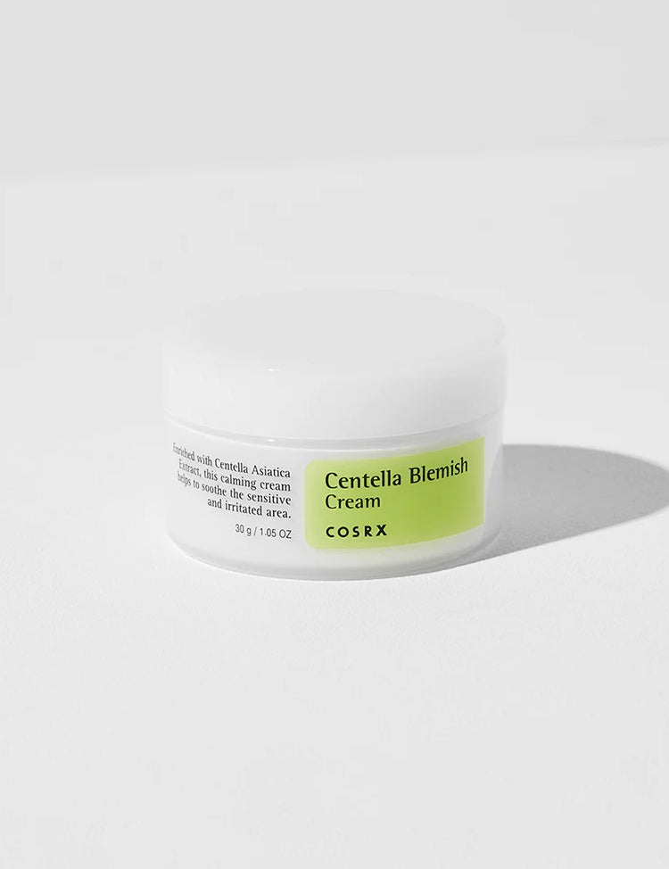 Cosrx Centella Blemish Cream in a white jar with green labeling, formulated to calm sensitive and irritated skin while promoting a healthier complexion.