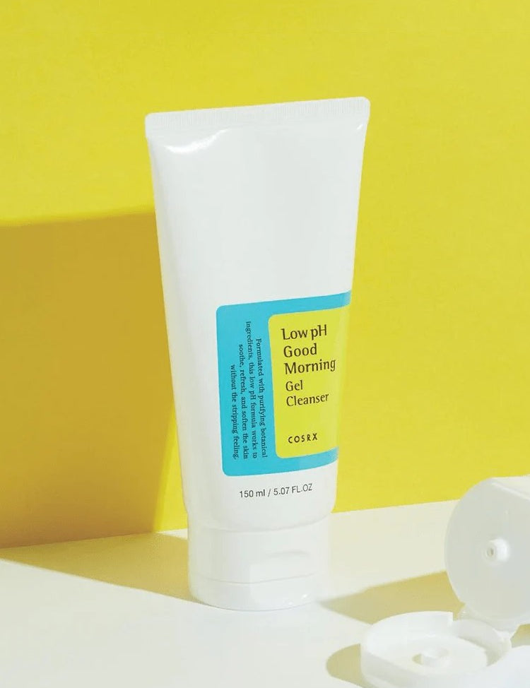 A tube of Cosrx Low pH Good Morning Gel Cleanser against a bright yellow background, emphasizing its fresh and clean design.
