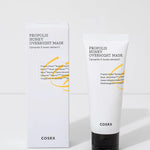 A tube of Cosrx Propolis Honey Overnight Mask placed next to its packaging, showcasing a sleek design and ingredient-focused details.