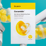 Dr. Jart+ Ceramidin Skin Barrier Moisturizing Mask packaging with bright yellow and white design, set against a turquoise background.
