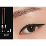 Close-up of an eye wearing bold black eyeliner from the Etude House Oh My Line Collection, featuring a smooth winged tip, with the eyeliner product labeled 'Black #1' displayed nearby.