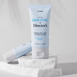 A tube of Etude House Soon Jung Director's Moisture Sun Cream SPF 50+ PA++++, displayed on white marble with a soft gray background.