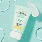 A tube of Etude Sunprise Mild Watery Light Sunscreen SPF 50+, surrounded by water droplets on a mint green background.