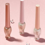 Etude House Tear Eye Liners in sleek bottles displayed on a sparkling pink background, adorned with scattered diamond-like gems.