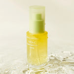 Goodal Green Tangerine Vita-C Dark Spot Care Serum bottle, highlighting its bright yellow gel-like texture and minimalistic design.