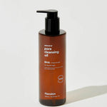 A brown bottle of Hanskin Pore Cleansing Oil with a pump dispenser, labeled for oily skin and formulated with BHA, featuring a 300 mL capacity.