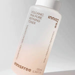 Bottle of Innisfree Volcanic PHA Pore Refining Toner, featuring a clean design with a subtle gradient, labeled for clear pores and sebum control.