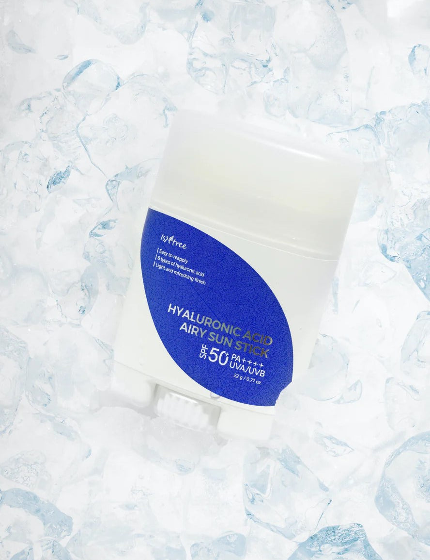 Isntree Hyaluronic Acid Airy Sun Stick SPF 50 placed on a bed of ice cubes, emphasizing its refreshing and cooling feel.