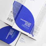 Close-up of the ISNTREE Hyaluronic Acid Watery Sun Gel packaging with a blue and white design, labeled SPF 50 for sun protection.