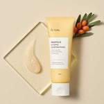 A tube of iUNIK Propolis Vitamin Sleeping Mask beside a dollop of gel, with sea buckthorn berries and leaves in the background, highlighting its nourishing ingredients.