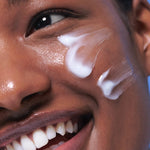 Close-up of a model’s cheek showcasing the lightweight gel texture of the Laneige Water Sleeping Mask, highlighting its smooth application and hydrating benefits.