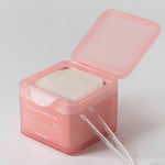 Pink container of Mediheal Collagen Ampoule Pads with a clear applicator beside it, highlighting its hygienic design and skincare benefits.