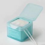 Open turquoise box of Mediheal Madecassoside Blemish Pad, revealing a white cotton pad and tweezers for easy application.