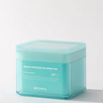 Teal container of Mediheal Madecassoside Blemish Pad, labeled for day and night use, specially formulated for blemish treatment.