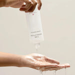 missha time revolution the first essence texture with hands