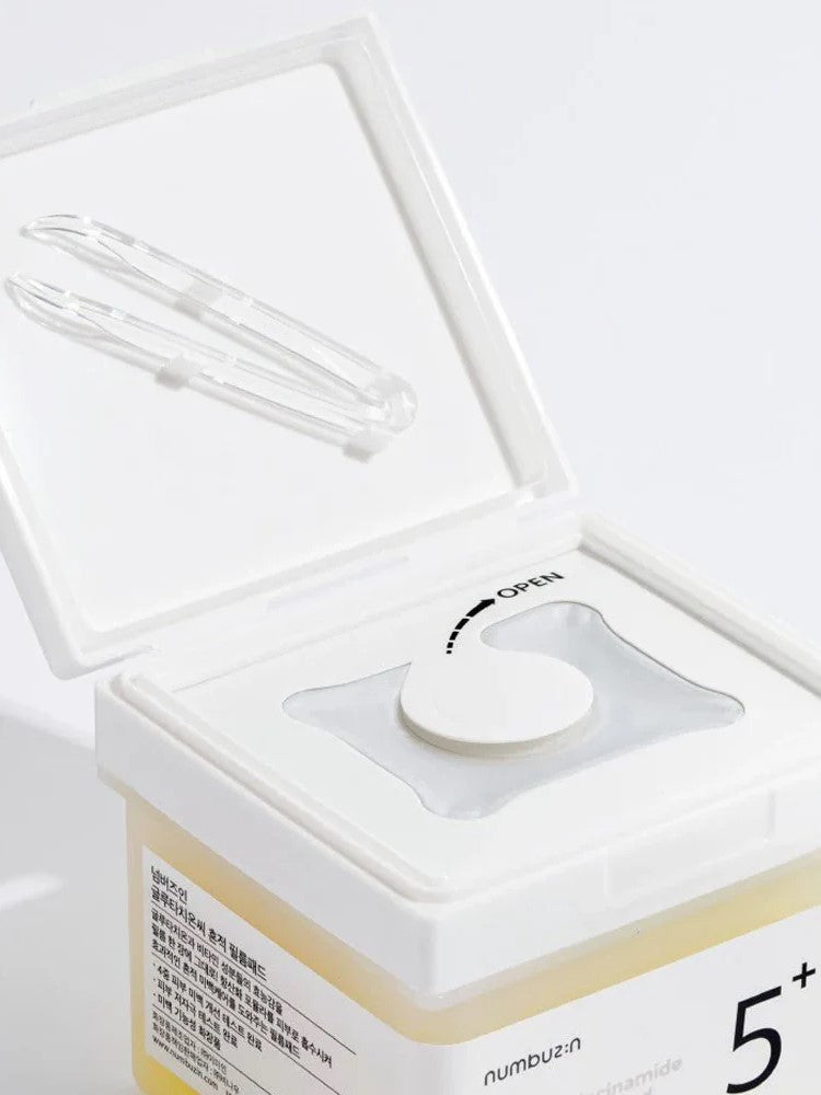 Numbuzin No.5 Vitamin-Niacinamide Concentrated Pad with its protective seal intact, showcasing the pad's secure packaging.