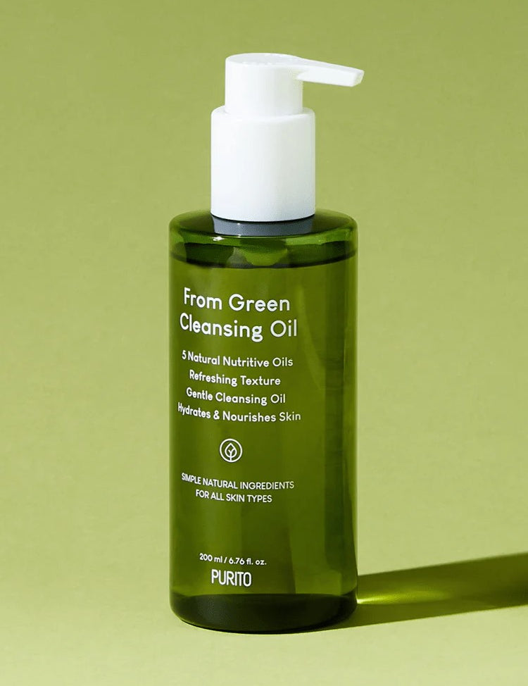Green bottle of Purito From Green Cleansing Oil with a pump top, showcasing labels highlighting benefits and natural ingredients suitable for all skin types.