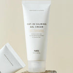Tube of Purito Oat-In Calming Gel Cream with calming label, placed on a textured stone surface, promoting soothing hydration for sensitive skin.